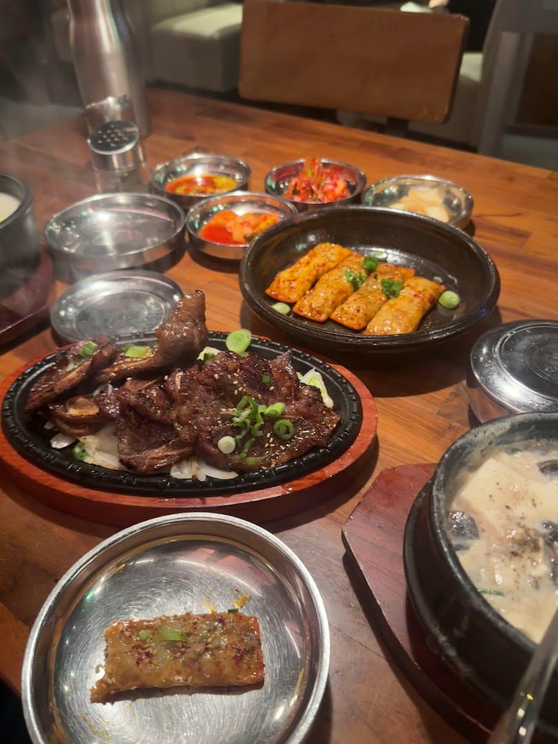 Shared plates in a cozy restaurant setting.