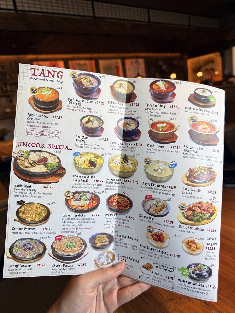 Korean dish names listed across a clean menu.